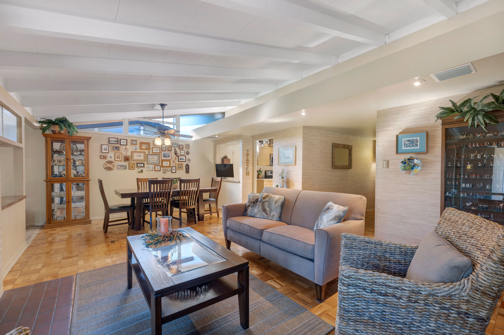 This Corbin Palms Mid Century Modern home was designed by renowned architects Dan Palmer & William Krisel. The homes open floor plan has 4 family bedrooms & 1.75 remodeled baths. The home is 1644 square feet situated on a 6900 square foot lot. The spacious sunlit living room has vaulted wood beam ceilings and is conveniently located adjacent to the dining room with lighted ceiling fan, family room with direct access to the backyard & remodeled kitchen. The family chef will love the remodeled kitchen with ample cabinets, quartz counters & backsplash, a newer range & microwave, refrigerator (included), newer dishwasher, dual basin stainless steel sink, large pantry & laundry room with washer/dryer (included). The living room has beautiful Parque wood floors & cozy floor to ceiling brick fireplace. The home’s many amenities include central AC/heat for year-round comfort, copper plumbing, newer roof, freshly painted exterior, remodeled kitchen, newer appliances, remodeled bathrooms & wood beam ceilings. You’ll enjoy entertaining family & friends in the lovely private backyard with lush mature landscaping, concrete patio & grassy play area. There’s a large concrete driveway and 2 car carport with storage. Close to orange line, World Class shopping, dining & entertainment at The Village at Warner Center & easy freeway access to the 101 freeway.