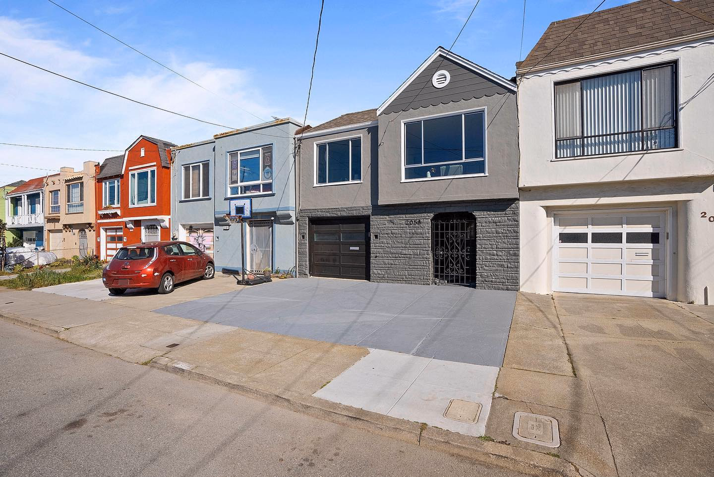 #justlisted 2058 45th Ave, an Outer Parkside charmer with 3 bedrooms and 1 bathroom just blocks to Ocean Beach! The upper level of the home features a large west-facing living room that flows into the dining area and updated kitchen. The bathroom is bright and refreshed with updated tile, a refinished tub, and skylight. The two bedrooms face east: capturing the morning sun and overlooking the backyard. On the lower level of the home is the 3rd bedroom, 2-car garage, washer and dryer, and access to the full-sized yard. This level is a prime candidate for expansion potential within the existing envelope. Completing this home are brand new hardwood floors throughout all the main living areas, fresh paint inside and out, and multiple updated fixtures. This home is ideally located near the beach, award winning schools, and the shops and restaurants along outer Taraval and outer Noriega including Gus's, Devil's Teeth Baking Co, Andytown Coffee, Underdogs Too, and White Cap! Not to be missed! #sanfrancisco #sanfranciscorealestate