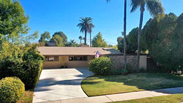 This Corbin Palms Mid Century Modern home was designed by renowned architects Dan Palmer & William Krisel. The homes open floor plan has 4 family bedrooms & 1.75 remodeled baths. The home is 1644 square feet situated on a 6900 square foot lot. The spacious sunlit living room has vaulted wood beam ceilings and is conveniently located adjacent to the dining room with lighted ceiling fan, family room with direct access to the backyard & remodeled kitchen. The family chef will love the remodeled kitchen with ample cabinets, quartz counters & backsplash, a newer range & microwave, refrigerator (included), newer dishwasher, dual basin stainless steel sink, large pantry & laundry room with washer/dryer (included). The living room has beautiful Parque wood floors & cozy floor to ceiling brick fireplace. The home’s many amenities include central AC/heat for year-round comfort, copper plumbing, newer roof, freshly painted exterior, remodeled kitchen, newer appliances, remodeled bathrooms & wood beam ceilings. You’ll enjoy entertaining family & friends in the lovely private backyard with lush mature landscaping, concrete patio & grassy play area. There’s a large concrete driveway and 2 car carport with storage. Close to orange line, World Class shopping, dining & entertainment at The Village at Warner Center & easy freeway access to the 101 freeway. 


