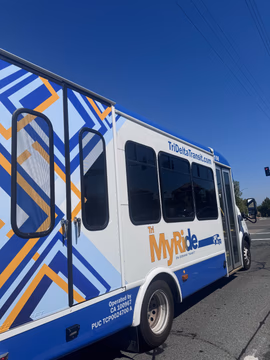 Did you know Pittsburg offers an on-demand, shared shuttle service? 🚐✨

 It's called Tri MyRide by Tri Delta Transit, and it’s a game-changer for getting around town without a car!  

What is the Service Zone? 🗺️
 Tri MyRide operates within specific, dedicated zones. If you’re in Pittsburg, you’ll be using the Pittsburg/Bay Point zone, which covers the neighborhoods surrounding the Pittsburg/Bay Point BART and Pittsburg Center eBART stations. As long as your trip starts and ends within this single zone, Tri MyRide has you covered! 

(Note: There are also separate zones for Antioch/Oakley and Brentwood if you're ever out that way).  

Here’s how it works:
📱  Tap: Open the Tri MyRide app (or call 925-470-4997)  to request a pickup anywhere in the zone.  
📍  Walk: Head to the nearby "virtual corner" indicated on your screen.
🚐  Ride: A white, yellow, and blue shuttle picks you up and groups you with neighbors heading in the same direction.
💸 Pay: It’s just $2 per ride (you can pay via the app, Clipper card, or exact cash).  

When it runs: ⏰
Weekdays: 5:00 AM – 9:00 PM  
Weekends & Holidays: 8:00 AM – 5:00 PM  

Who uses it:
🚆 Daily Commuters connecting to the BART stations who want to skip the morning parking hunt.
🎒 Students catching a reliable, affordable ride to class
.🛒 Locals running errands, heading to medical appointments, or just grabbing groceries.  

And how it started:
It was born to solve the classic "first and last-mile" problem. Transit planners realized that for a lot of residents, the hardest part of taking public transit was just getting from their front door to the actual station. Launched as an innovative micro transit pilot program, it was specifically designed to bridge the gap between our residential neighborhoods and major transit hubs. Today, it's a local favorite keeping the community connected!